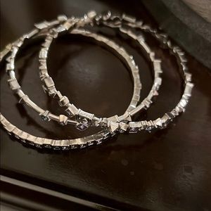 Kendra Scott bangles in silver tone and indigo crystals